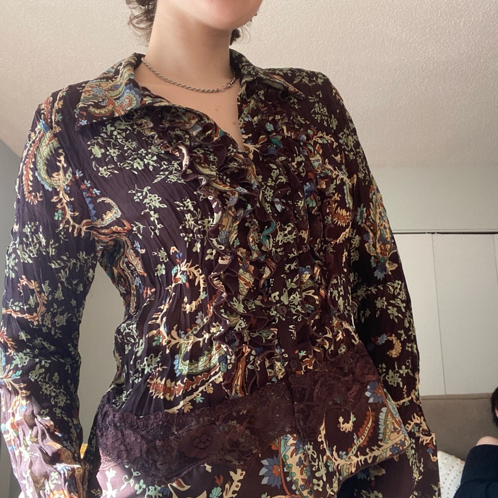women’s vintage large top with lots of colorful and textured detailing.